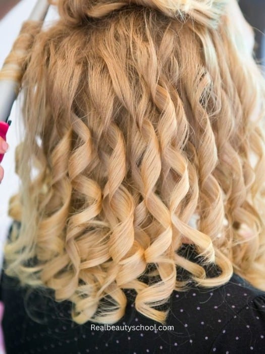 strong well defined curls by an automatic hair curler