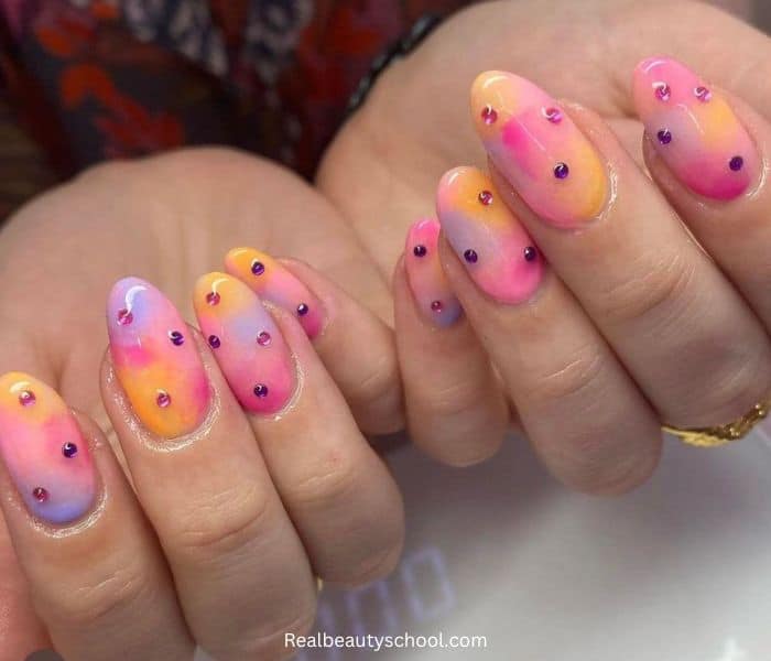 pink and yellow aura nails