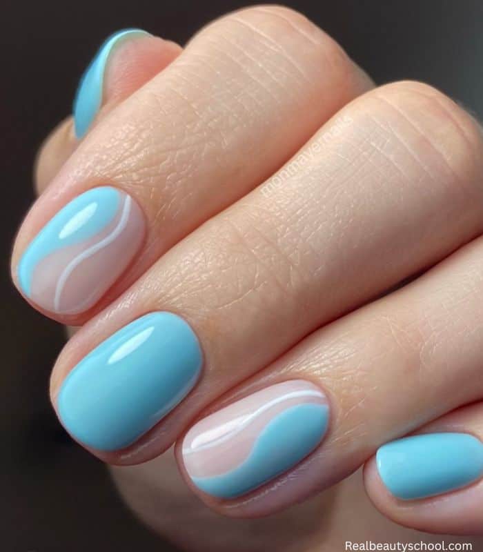 simple baby blue swirl nails