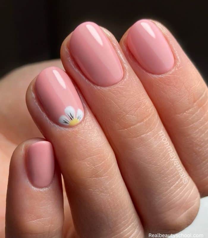 simple flower on baby peach nails